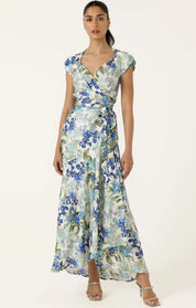 Woman wearing a floral dress on a white background