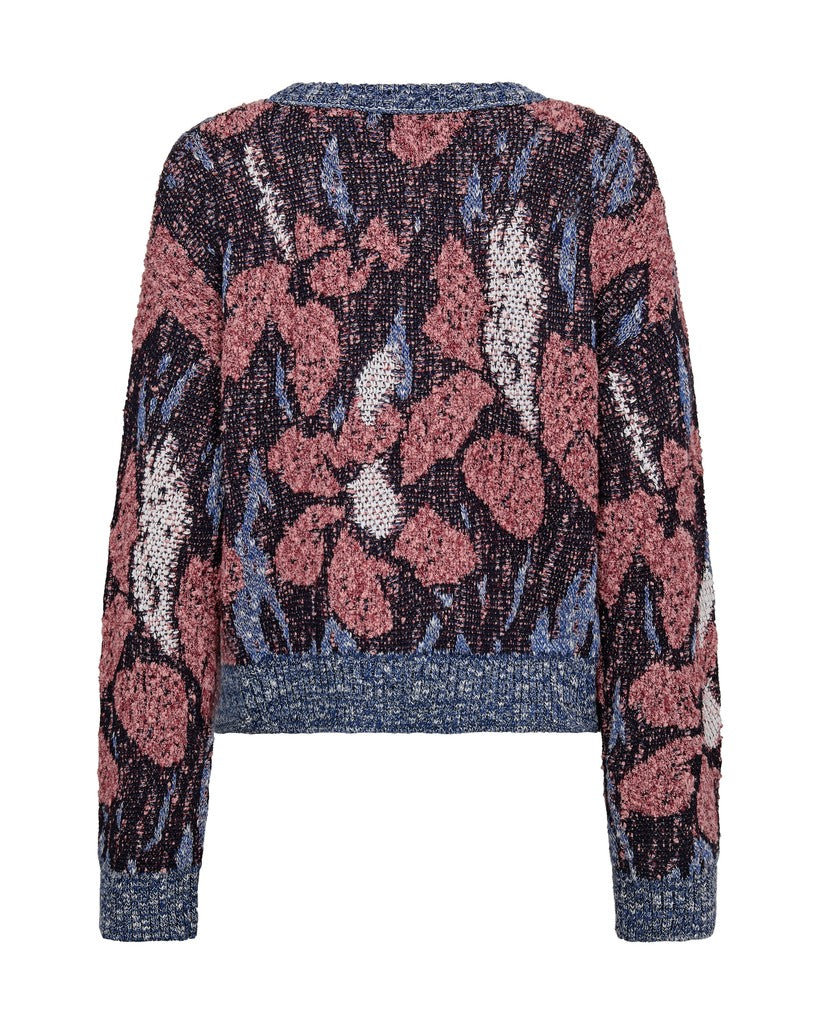 Floral patterned sweater with pink and blue colors on a white background