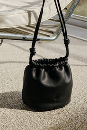 Shop Indi & Cold Bolsos Gathered Bucket Leather Bag - Indi & Cold