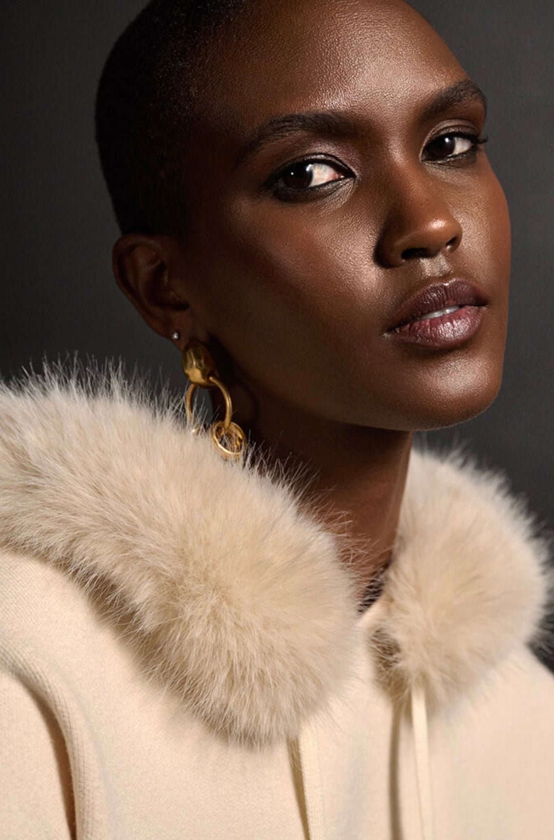 Shop Sweater With Faux Fur Hood & Pompoms Style 234921 │ Almond - Joseph Ribkoff