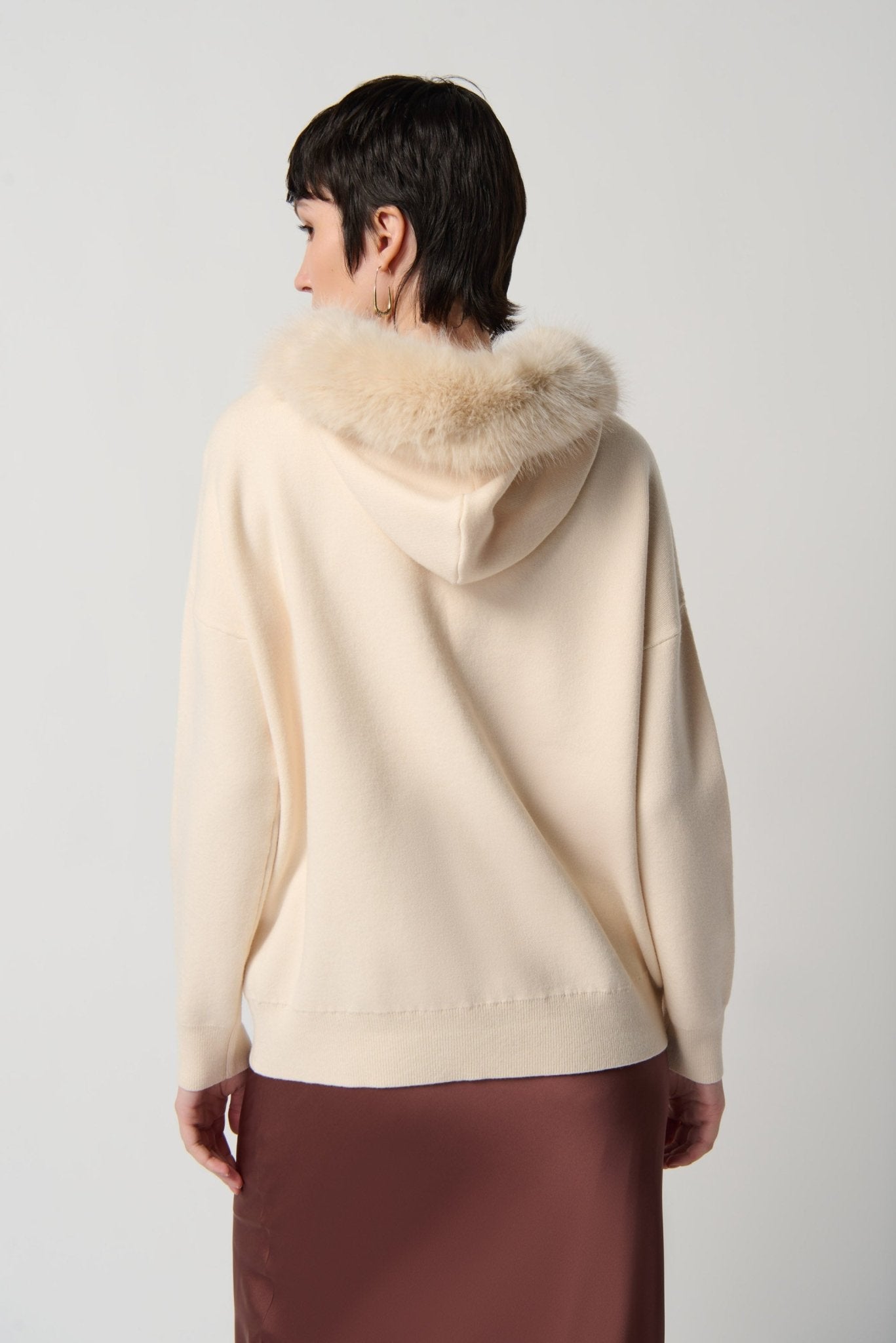 Shop Sweater With Faux Fur Hood & Pompoms Style 234921 │ Almond - Joseph Ribkoff